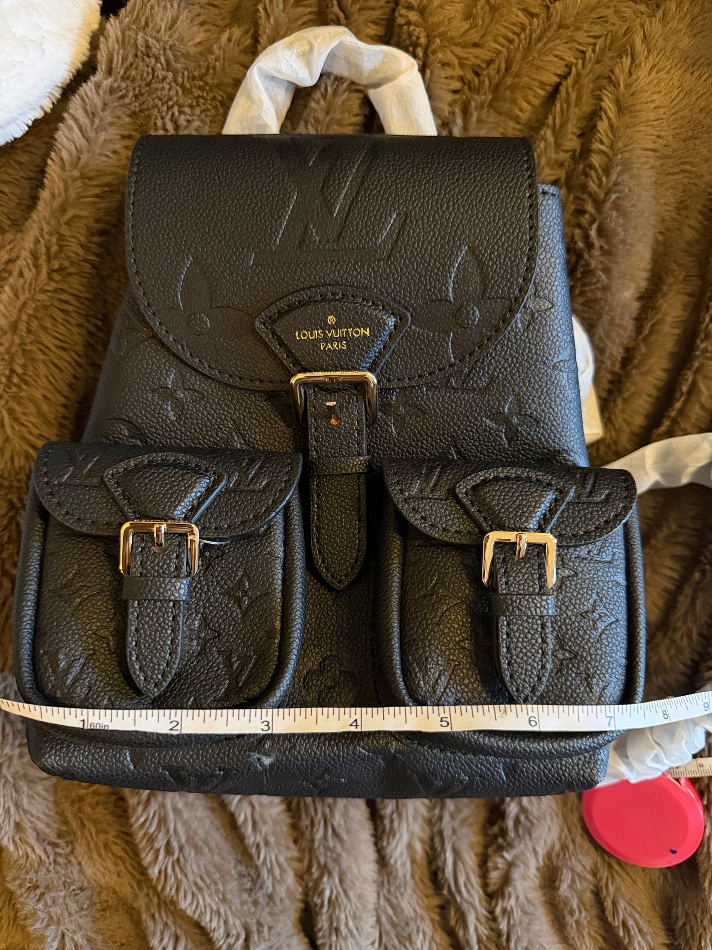 L logo backpack